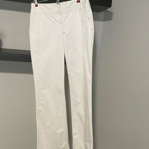 White stretch flared low rise slacks